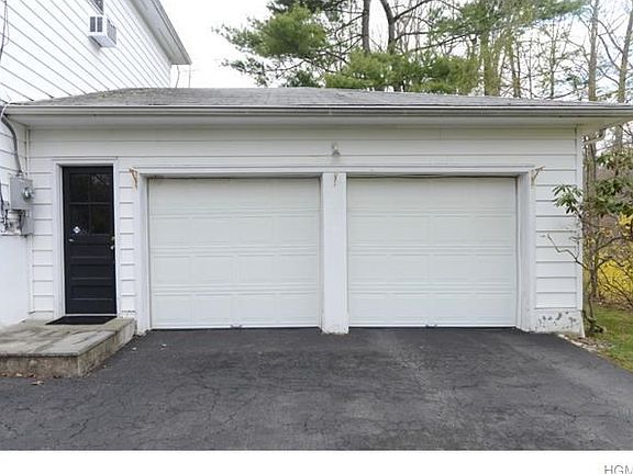 Roomy 2 car garage with door in front