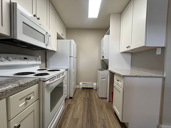 Kitchen- oven, fridge, dishwasher, washer and dryer