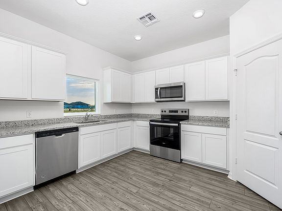 A chef-ready kitchen with a walk-in pantry