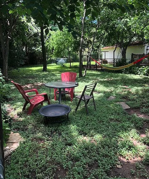 Outdoor space has been updated with firer pit and gravel pad.