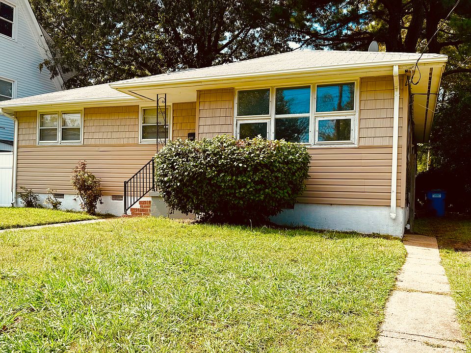 Charming ranch with newer exterior siding and large front and back yard.