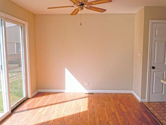 Dining Area with Hardwood Floors and Outside Access