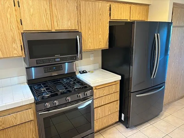 Gas range/oven & refrigerator are included.