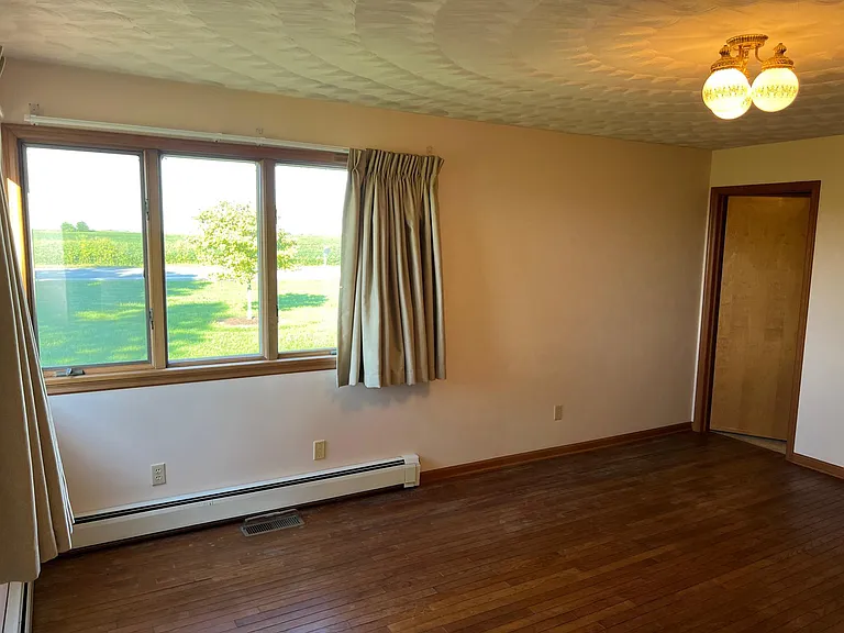 Master Bedroom with door to 1/2 bath