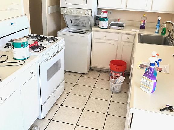 kitchen with dishwasher and washer/dryer