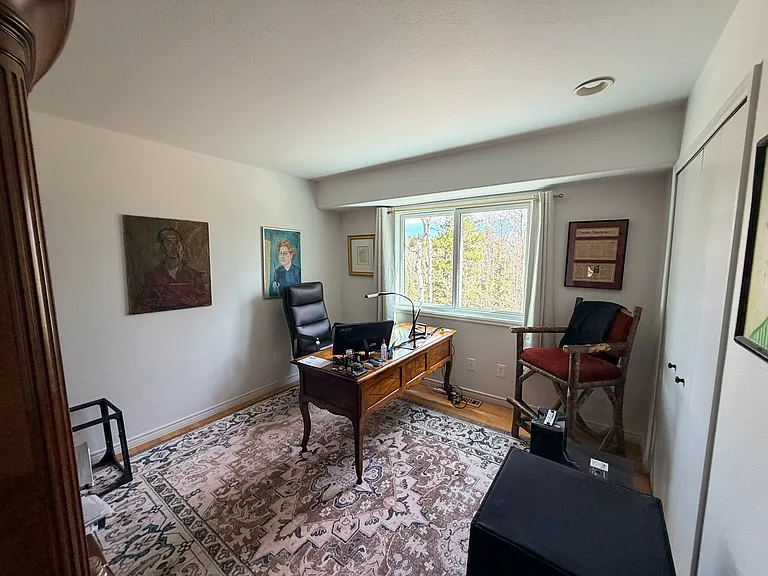 Bedroom #2 hardwood floors, new window with views, closet. Current tenant is using this as an office