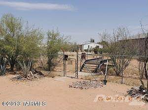 Gate to bridge and rear of property