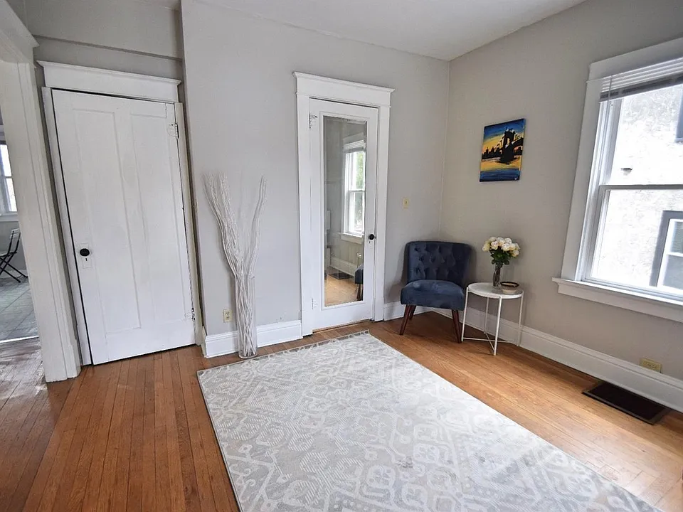 Front room
- bathroom door on right
- closet door on left