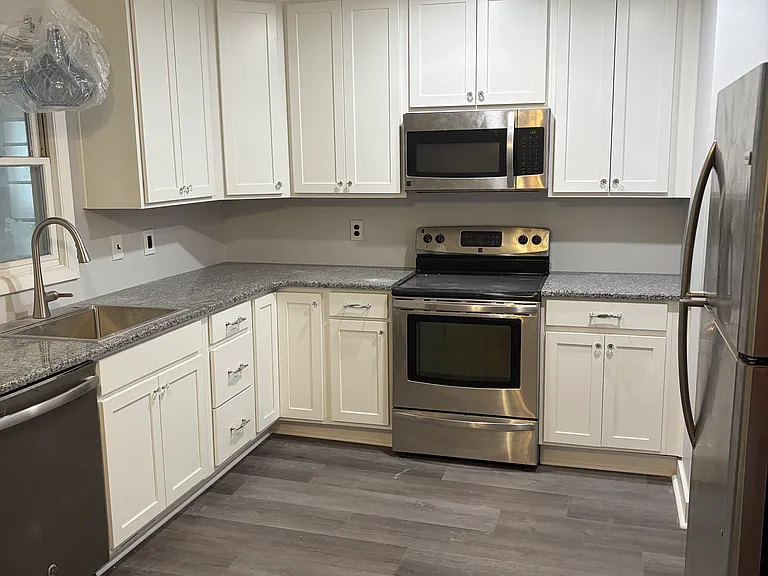 Brand new Updated kitchen with lots of cabinet space.