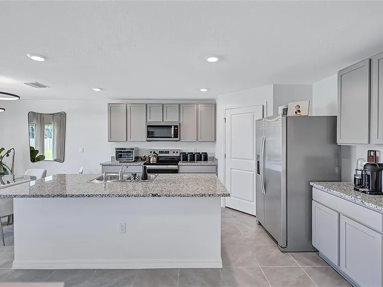 7601 Rosewood Garden Loop — Photo 8