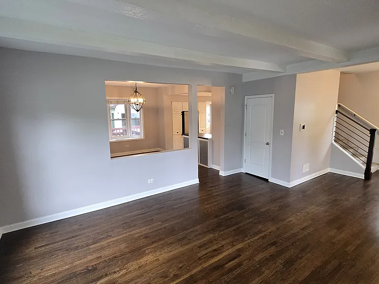 Living Room and Stairway to Second Floor