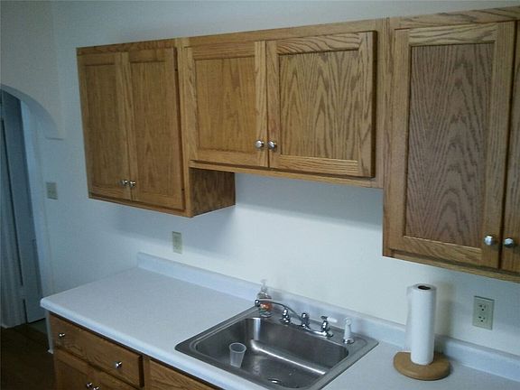 Lots of cabinets in kitchen