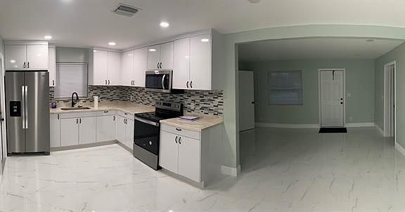 4th image of 4615 Melaleuca Ln