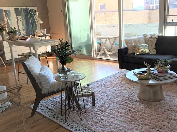 Open floor plan - living/dining room leads out to private balcony