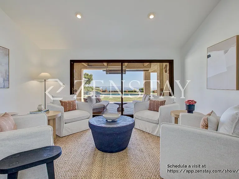 Sun-filled living area designed for comfort, gathering, and easy entertaining