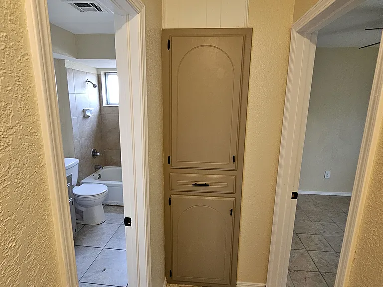 Hallway between bedrooms/main bathroom
