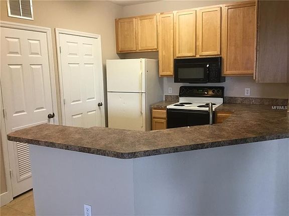 3rd image of 10213 Courtney Palms Blvd APT 304