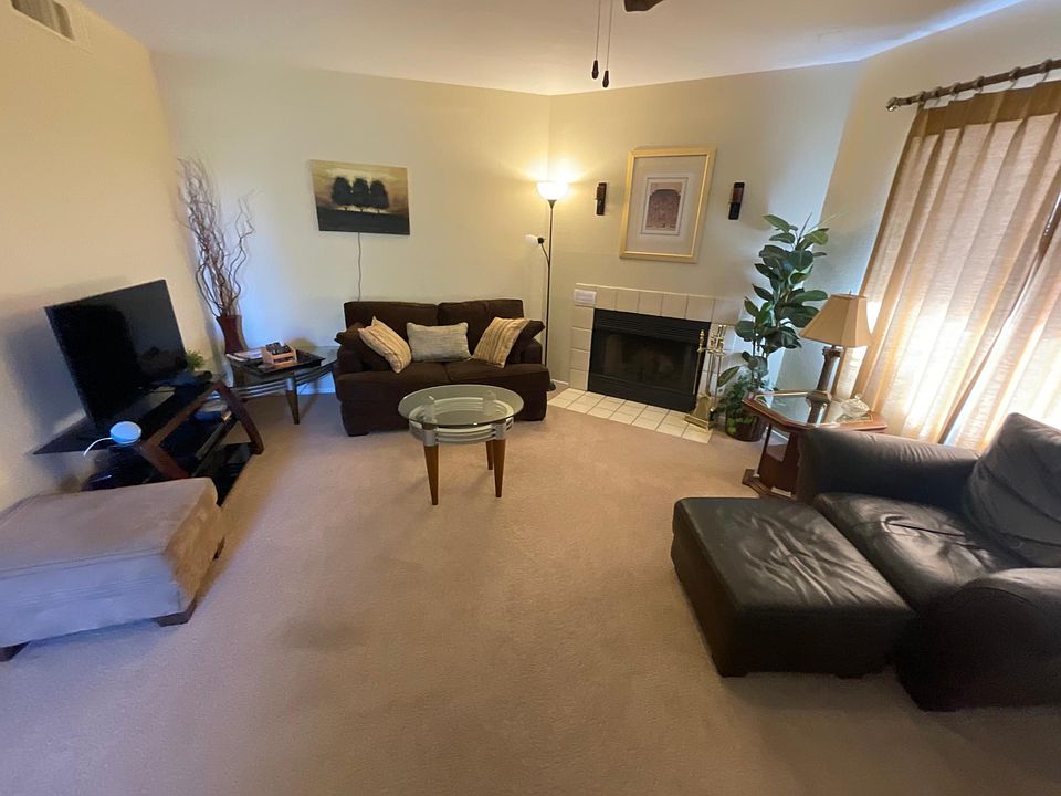 Living room, smart tv, fireplace.