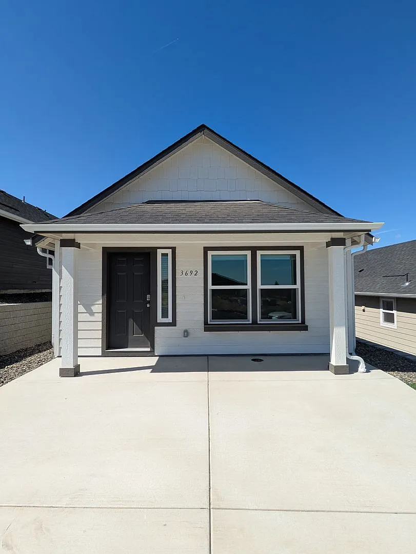 New Single Level Home in SunRidge Community — Photo 1