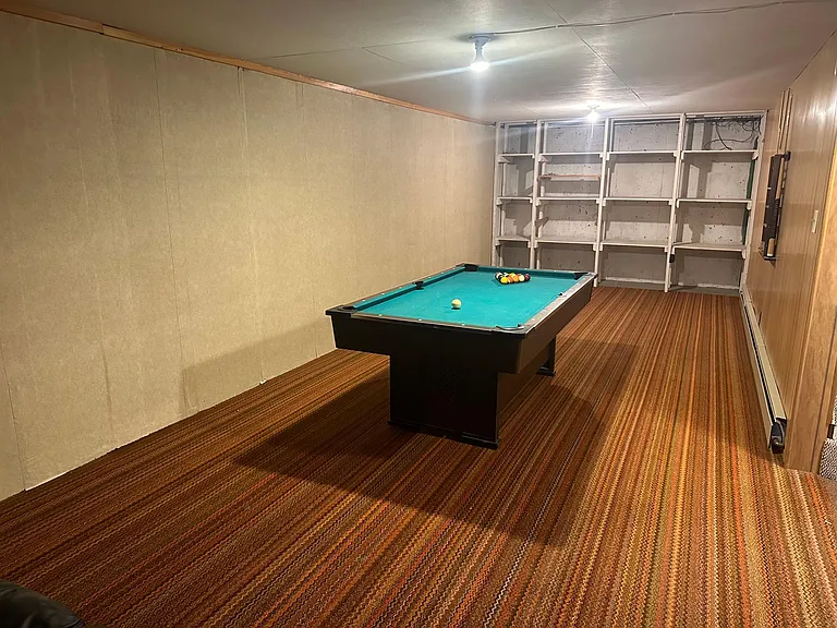 basement pool table and sotrage