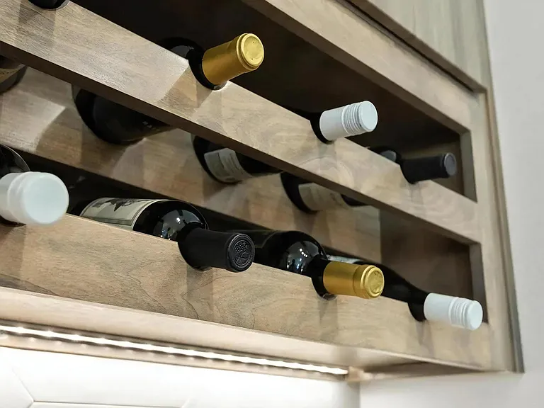 Kitchen Cabinet Featuring Horizontal Wine Bottle Display