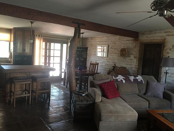Kitchen island, dining area, sliding door to back patio