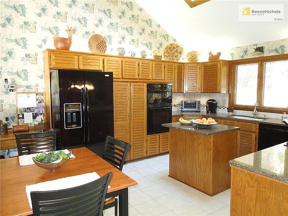 Bright kitchen with large skylight and center island.