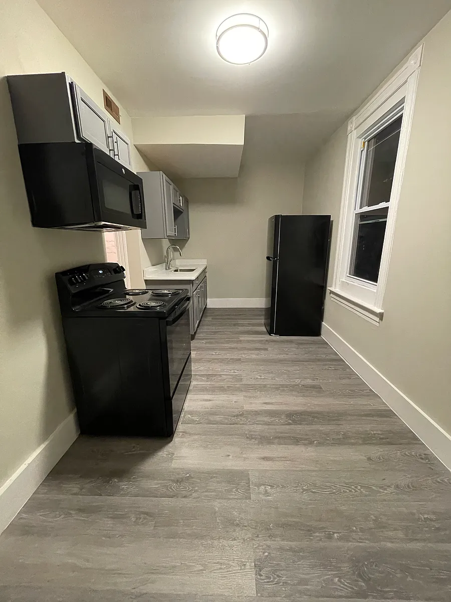 Building Photo - 1715 Kinney Ave #2