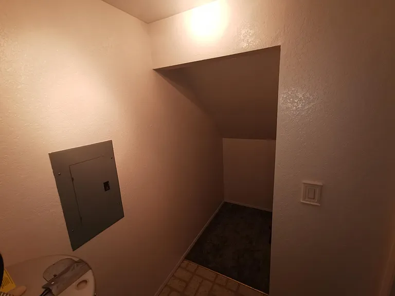There is actually a 3rd room downstairs with is a storage room.