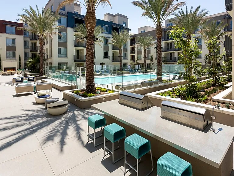 Courtyard with Pool BBQ Area Seating and Fireplace