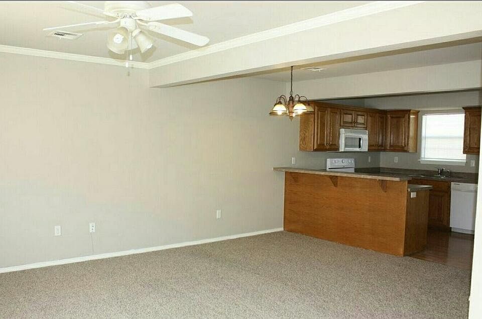 Living room and dining area with breakfast bar
