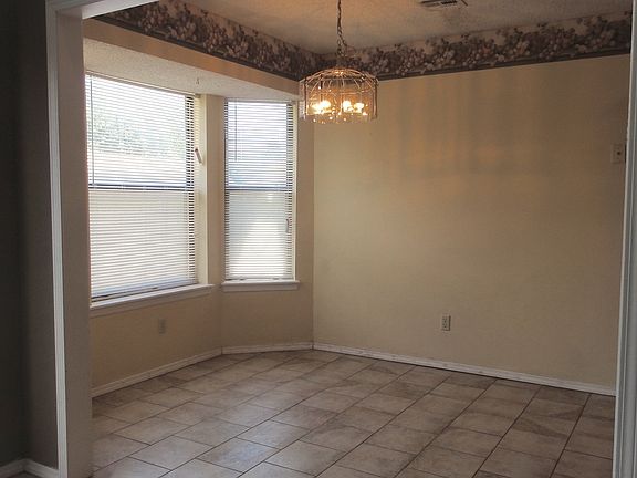 Bay windows in dining area lets in lots of light to the kitc
