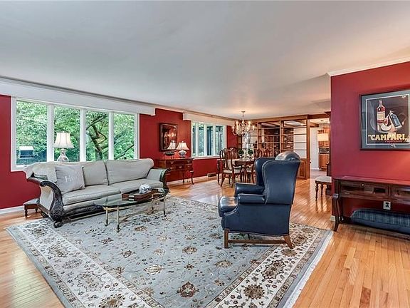 Gleaming hardwoods and natural sunlight greet you as you enter into the large, open family room.