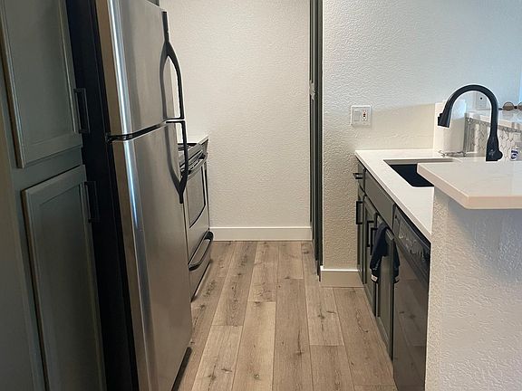 2nd image of 2938 N 61st Pl Unit 209