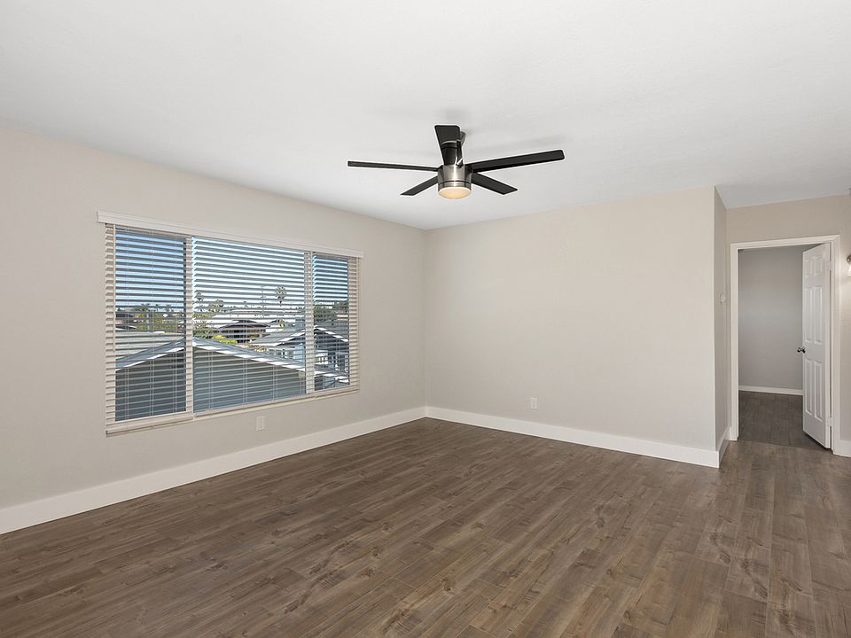 Living Room, facing hallway to bedrooms and bathroom.