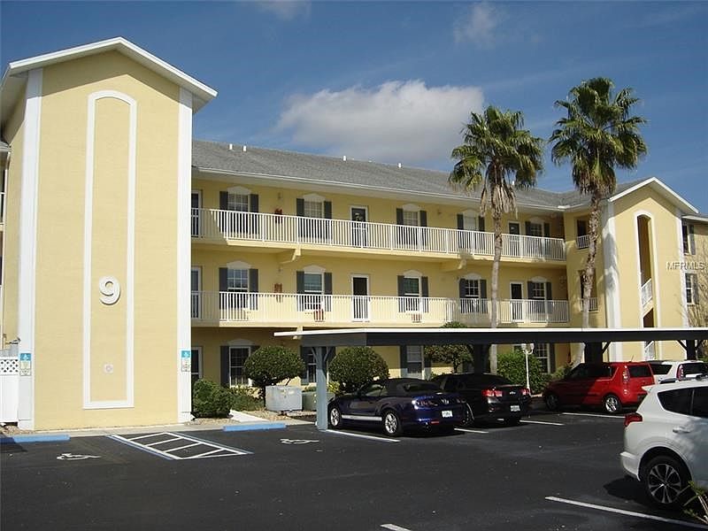 Southwest Exposure, condo is on second floor. Stairs to the right and an elevator on the left.