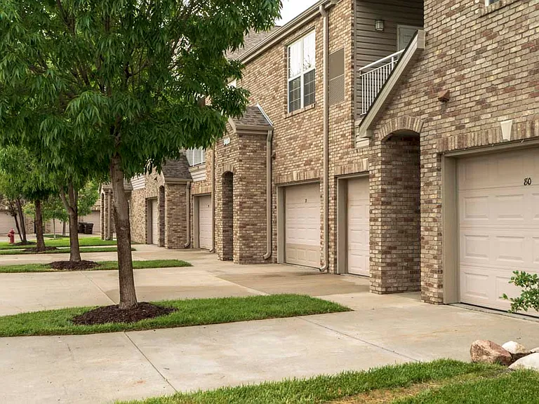 Convenient attached garages add to the ease of living here.