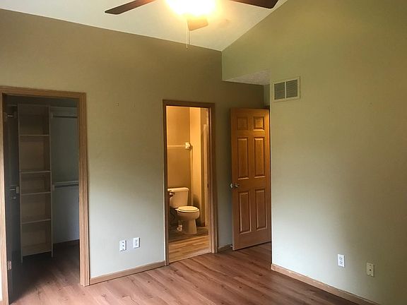 master bedroom walk in closet & full bathroom