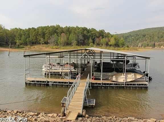 First slip on right & boat.