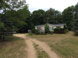 15446 W Gates Rd, Howard City, MI 49329