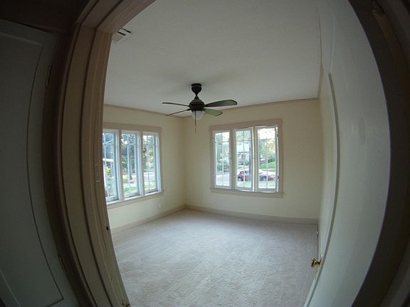 Naturally Lit Front Bedroom w/ceiling fan
