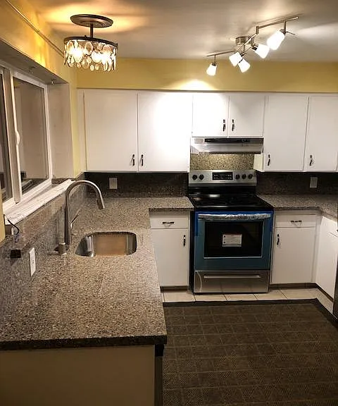 Brand new granite and stainless steel appliances