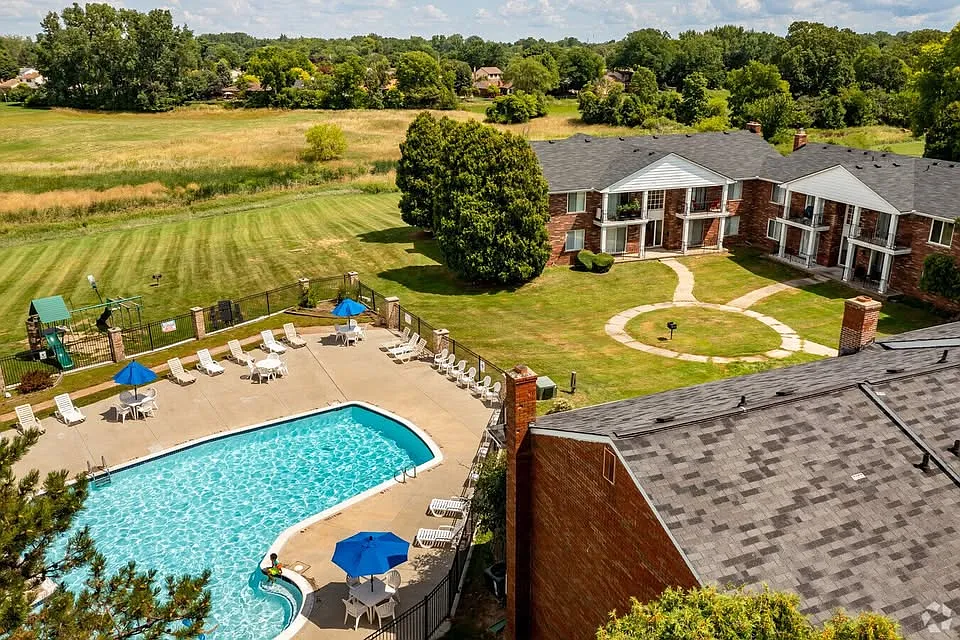 Aerial of the pool/clubhouse and common areas. You will have access to these areas as a renter. - 37099 Nottingham Dr #6