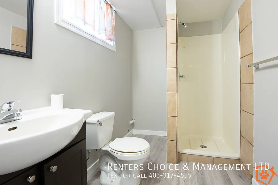 Updated Basement Suite Includes Utilities, Parking + Cat Friendly — Photo 4