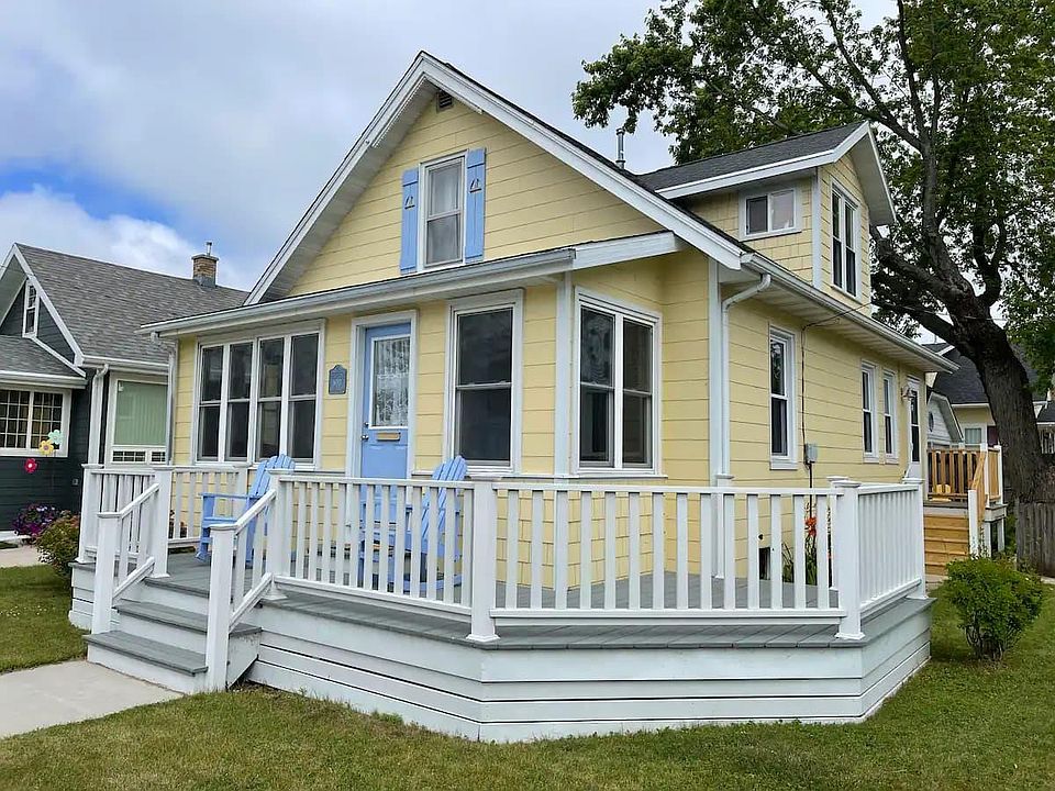 Lakeview Cottage is extremely quiet neighborhood. Lake view from all these windows.