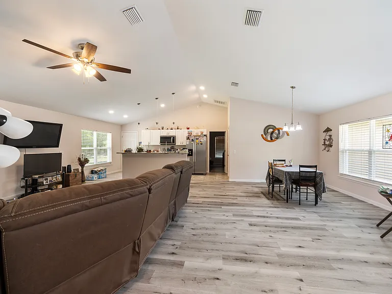 UNFURNISHED LIVING ROOM/DINING ROOM COMBO