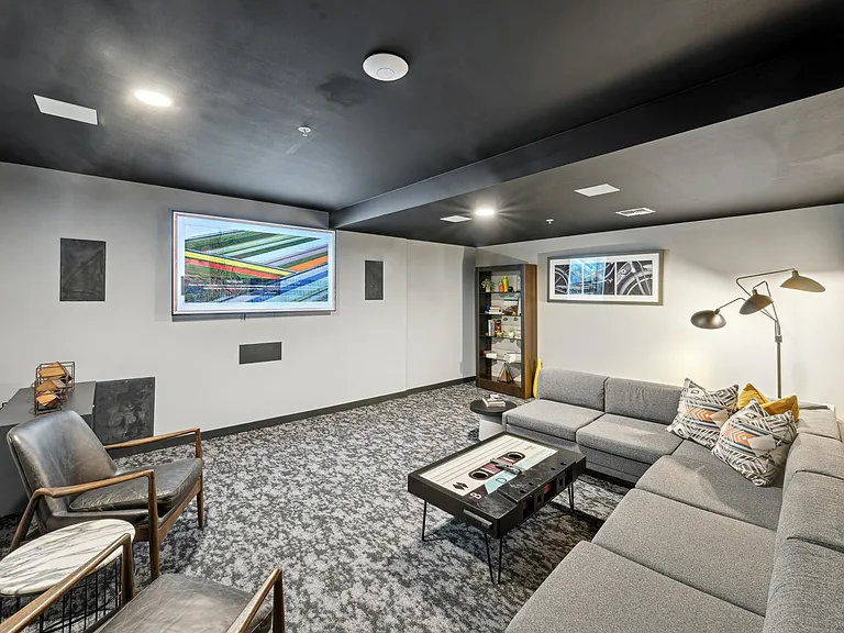 Sit back and relax in the cozy media room, perfect for movie nights, game days, or casual hangouts.