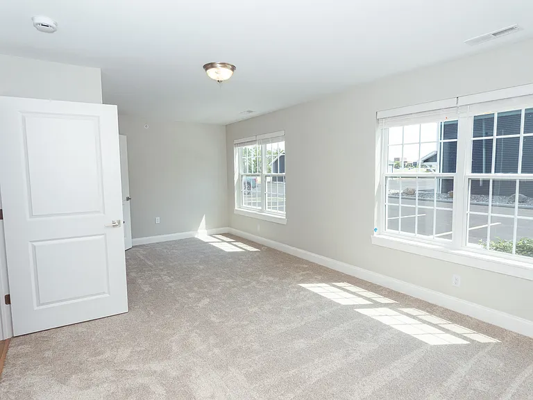 Left of the bedroom from entrance door.