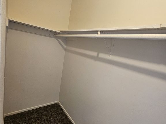 Walk-in closet in bedroom