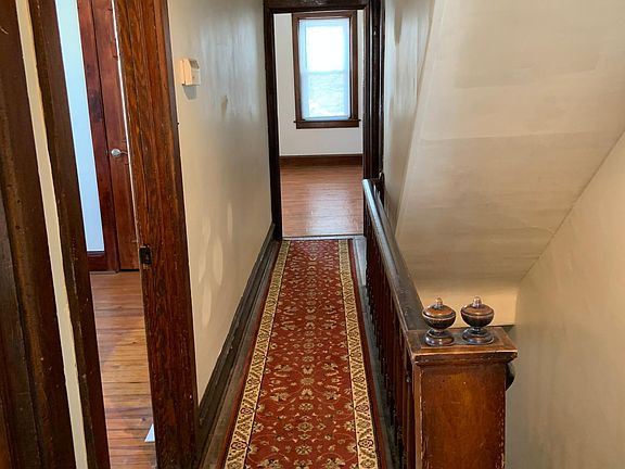 Hallway to bedroom and living room or office and living room